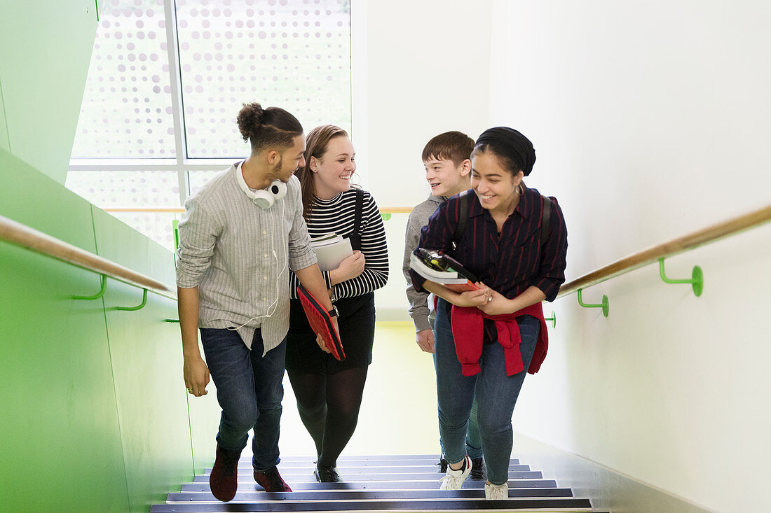 High school girls ascending stairs