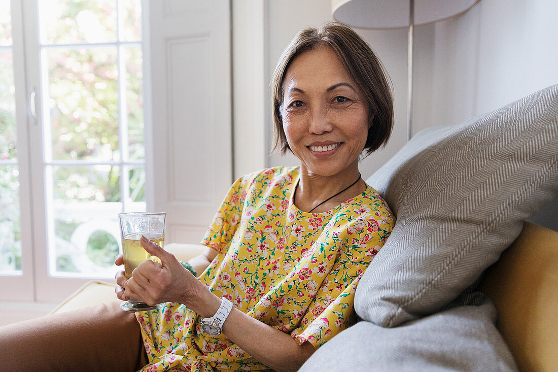 Portrait senior woman drinking tea