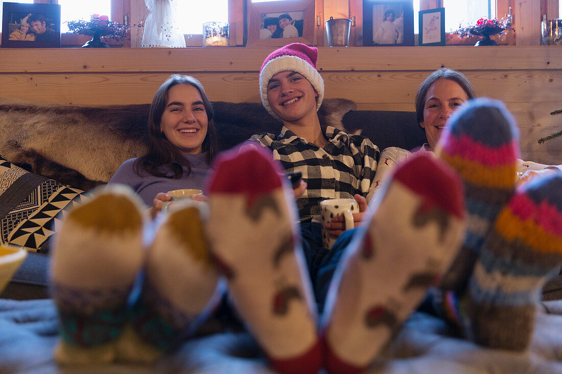 Family in colourful socks relaxing