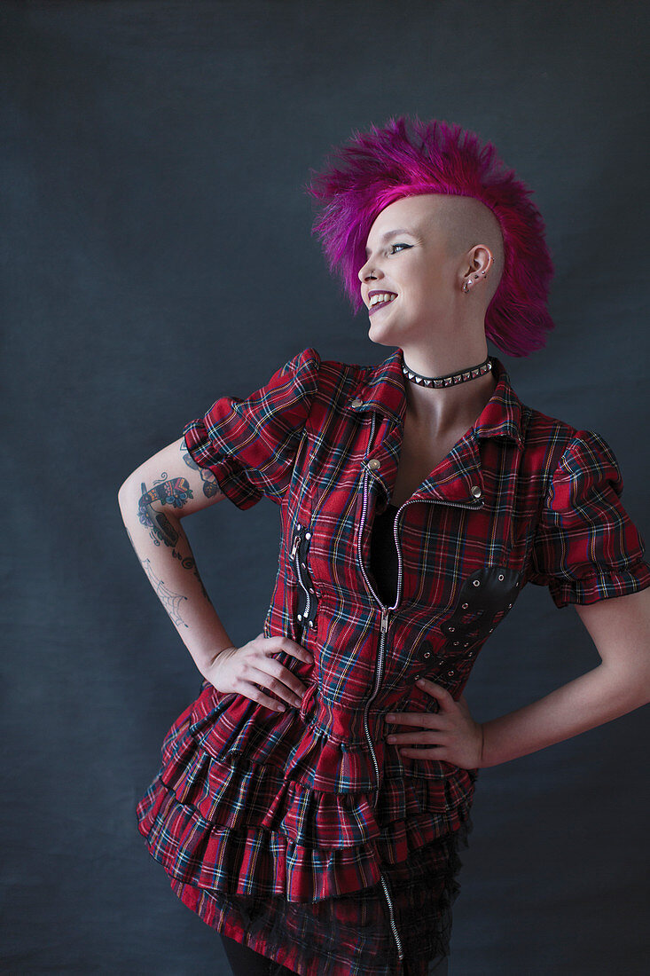 Portrait young woman with pink mohawk