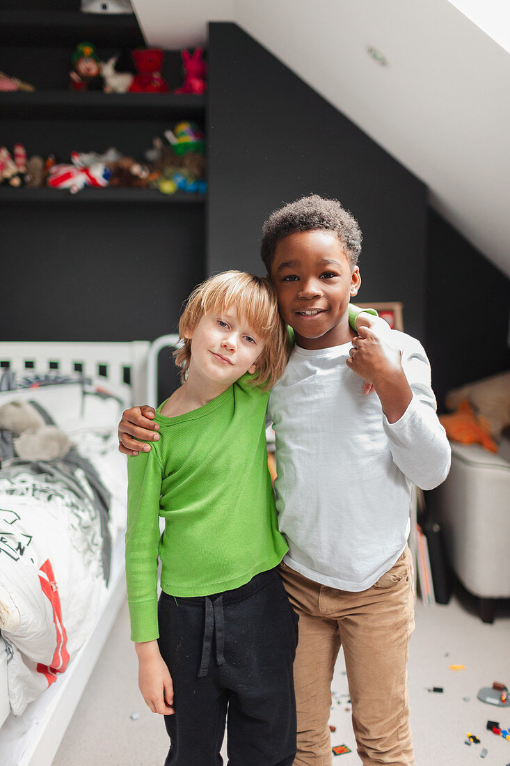 Portrait boy friends hugging