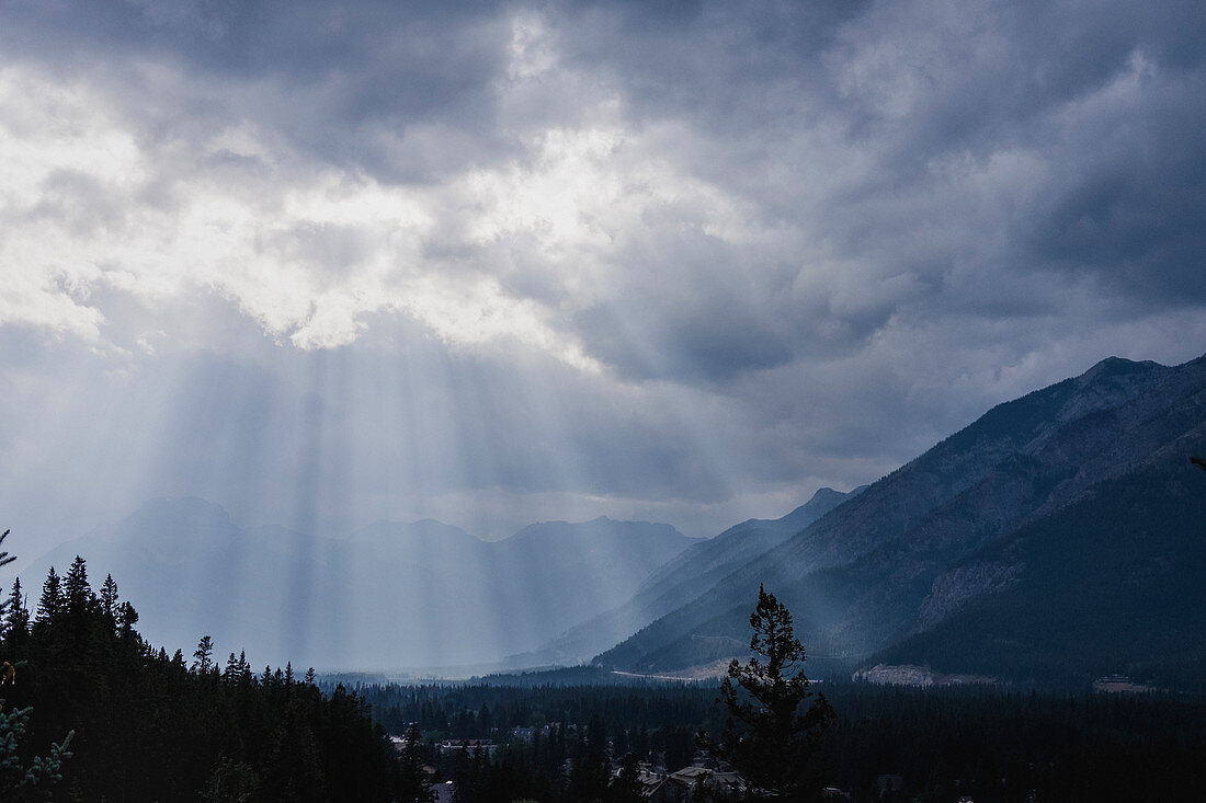 Sunbeams breaking through clouds, Alberta, Canada