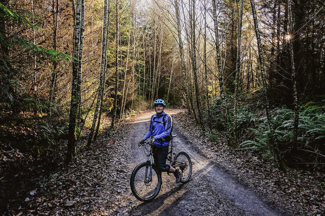 Portrait man mountain biking, Canada