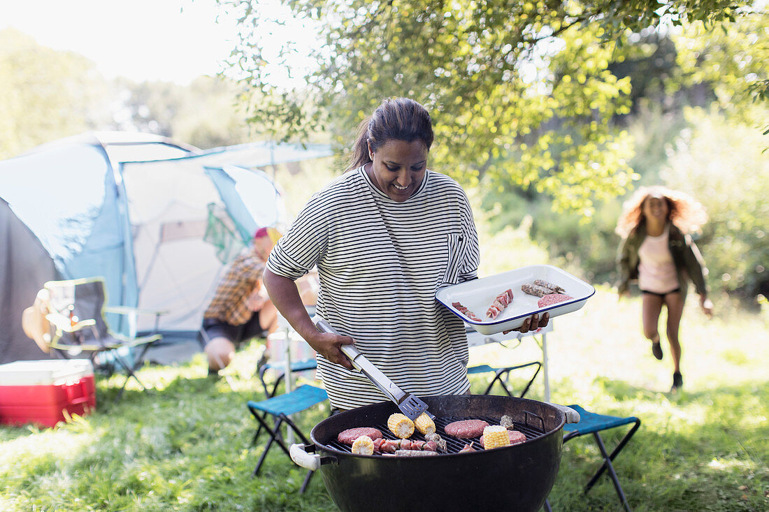 Woman barbecuing