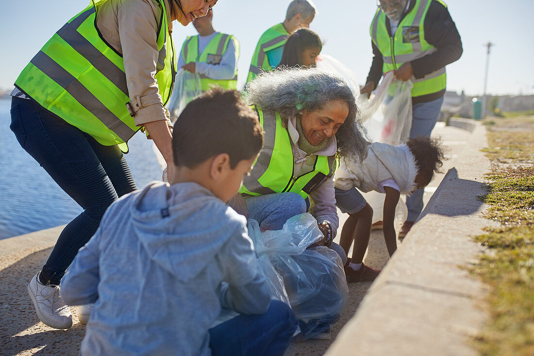 Volunteers cleaning up litter on boardwalk