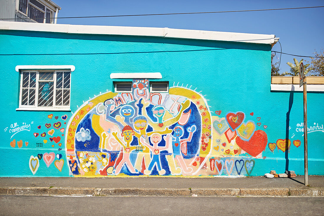Vibrant community mural on urban wall
