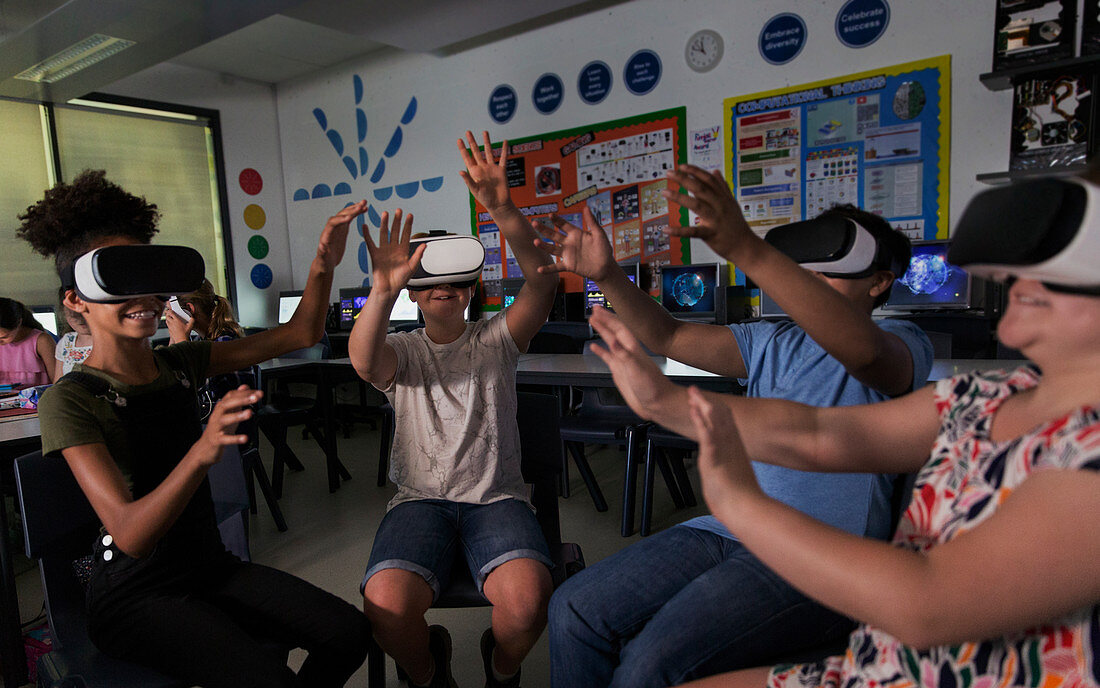 school students using virtual reality simulators
