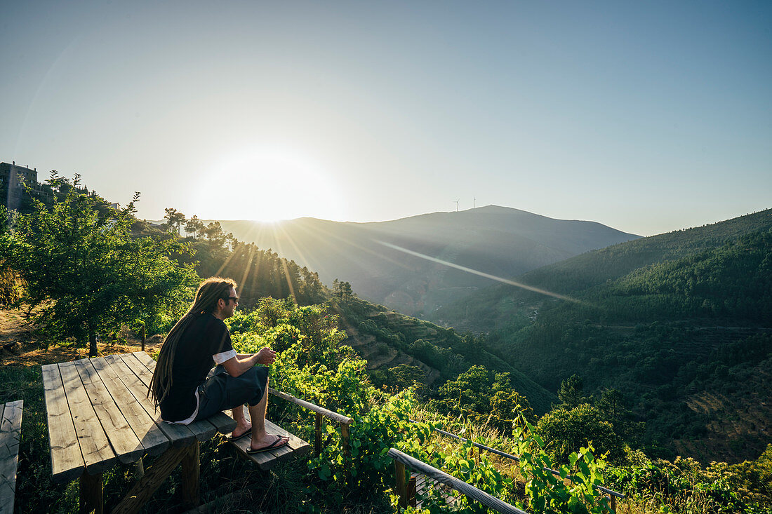 Man enjoying landscape view, Chas de Egua, Portugal