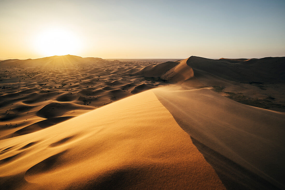 Sun shining over Sahara desert , Morocco