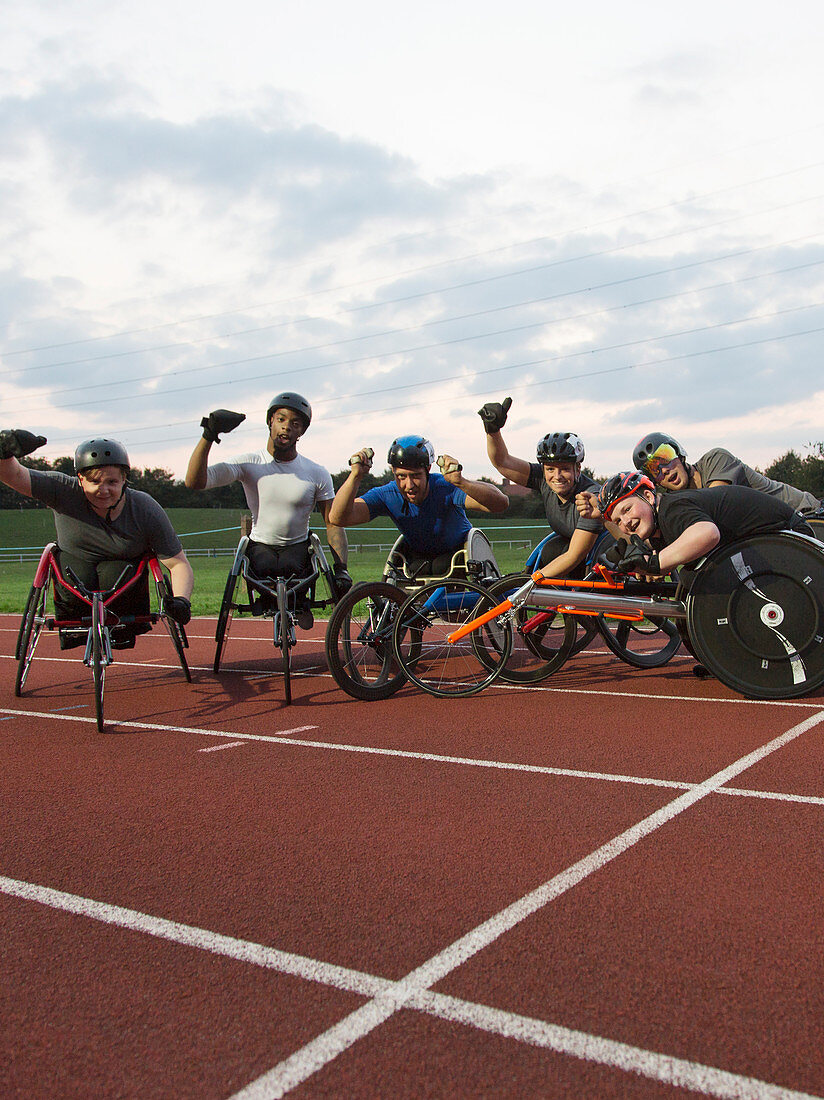 Paraplegic athletes cheering