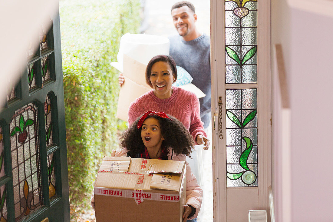 Excited family moving into new house