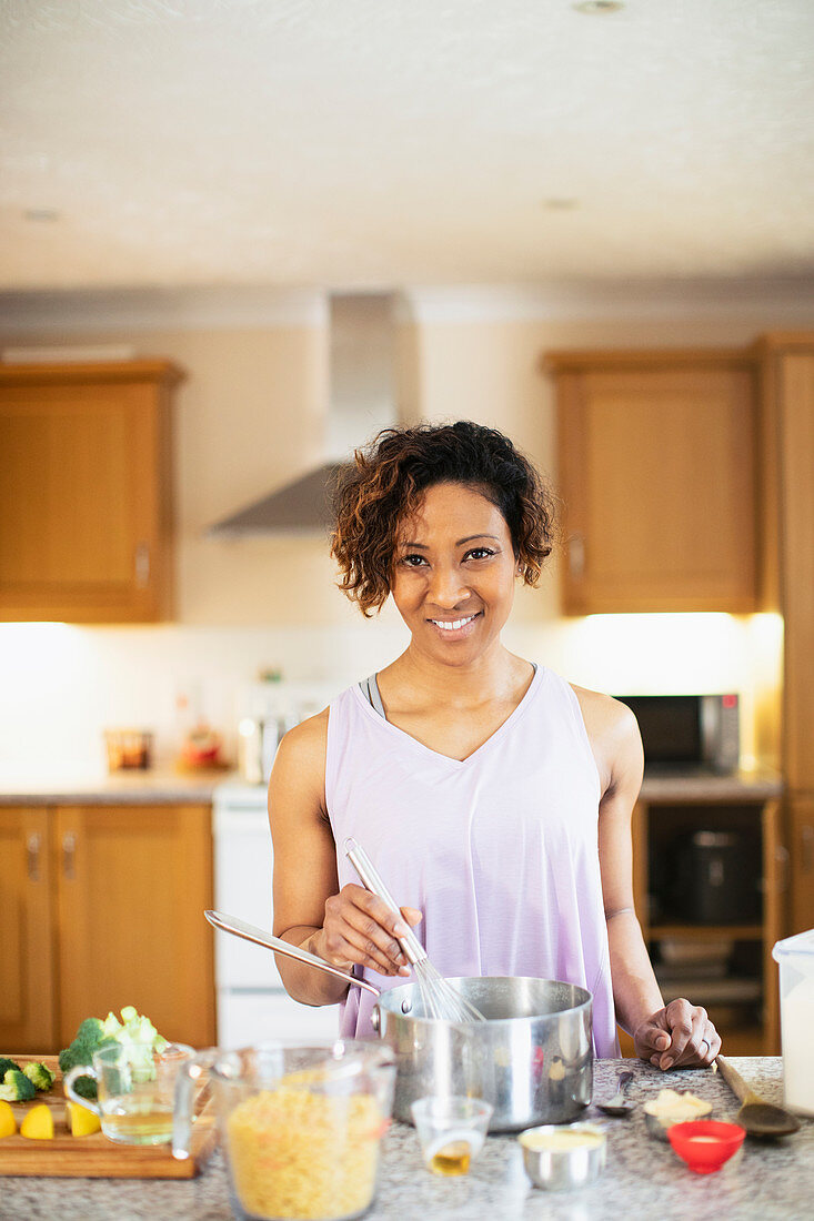 Smiling woman cooking