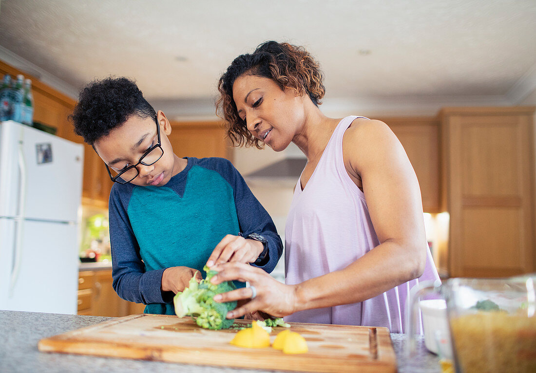 Mother and son cooking