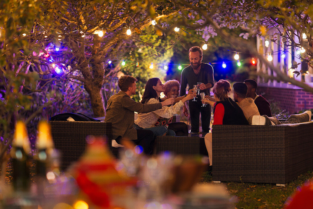 Friends drinking under trees