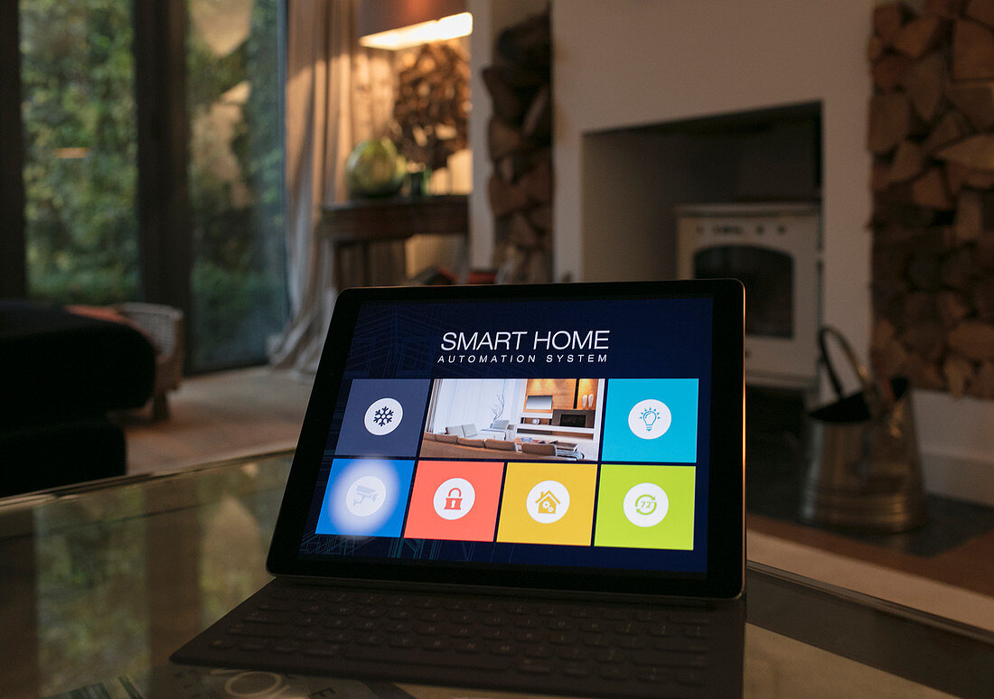 Smart home automation system on tablet in living room