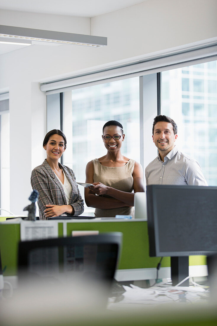 Portrait business people in office