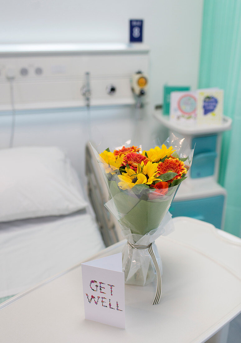 Flower bouquet and Get Well card on tray