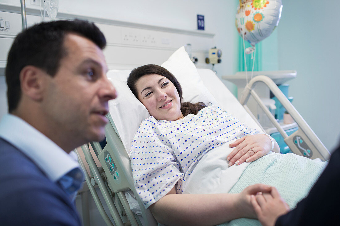 Patient visiting with family in hospital room