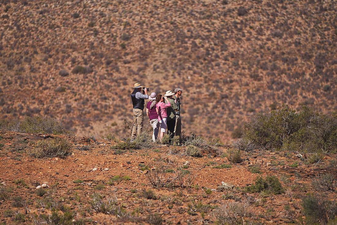 Group in sunny grassland landscape South Africa