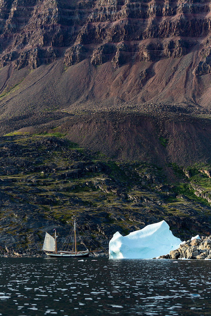 View of ship and iceberg in Disko Bay West Greenland