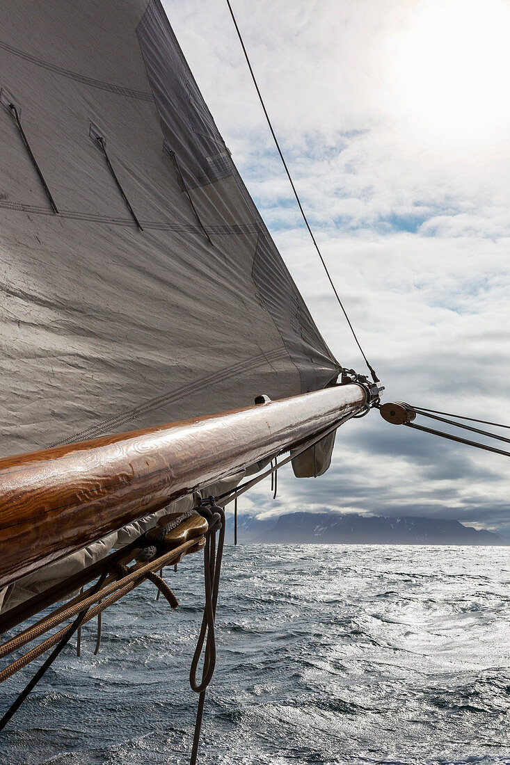 Sailboat mast over ocean