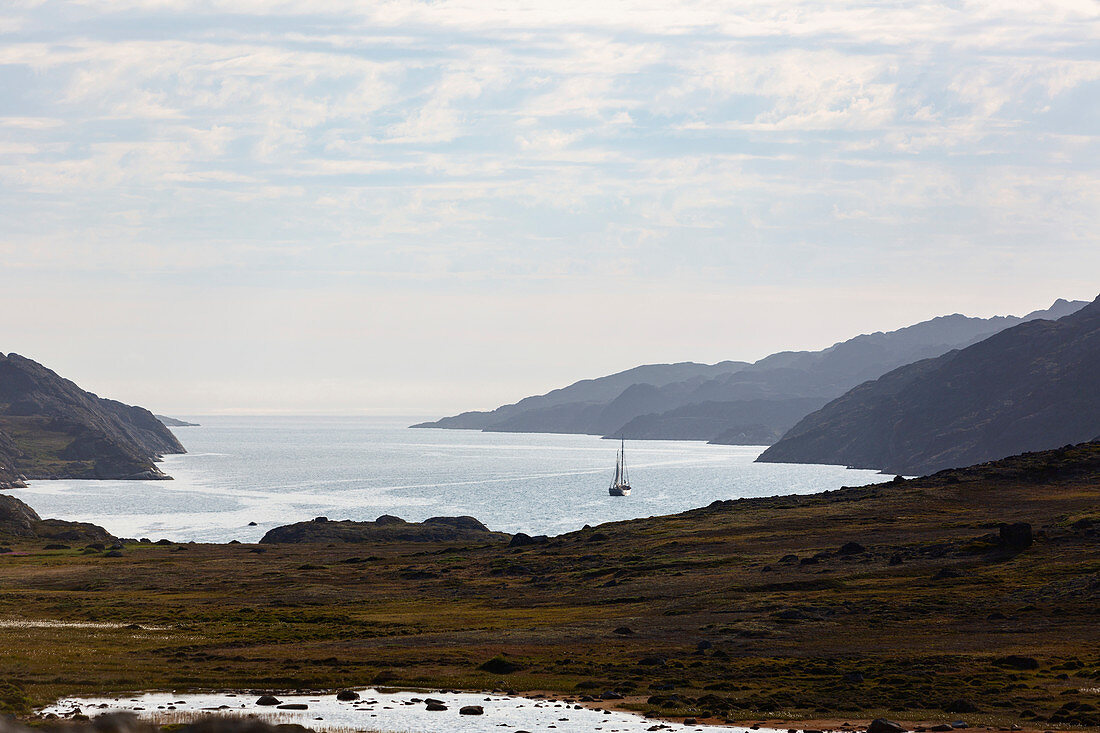 Scenic view ship in remote Disko Bay West Greenland