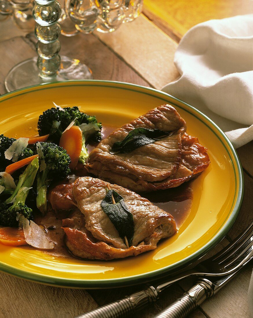 Saltimbocca with broccoli & carrots and parmesan shavings