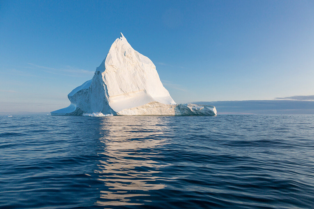 Majestic iceberg on tranquil blue Atlantic Ocean Greenland