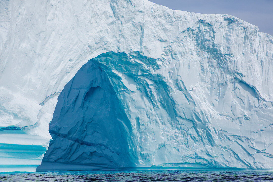 Majestic iceberg arch Greenland