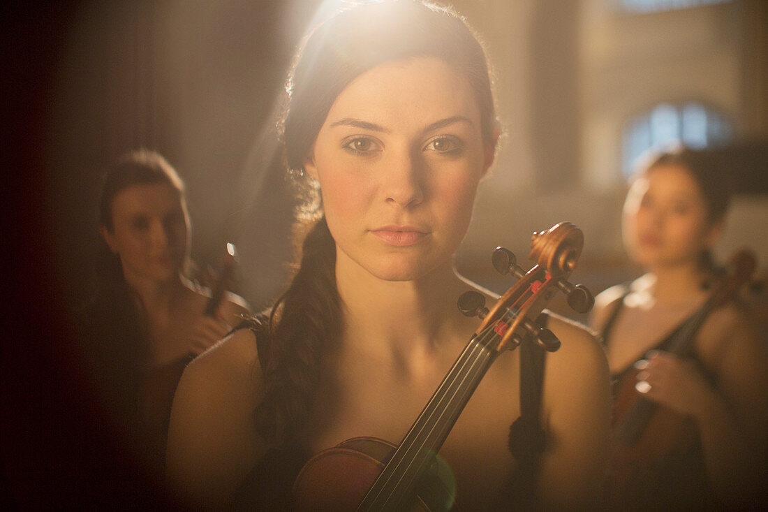 Close up of serious violinist