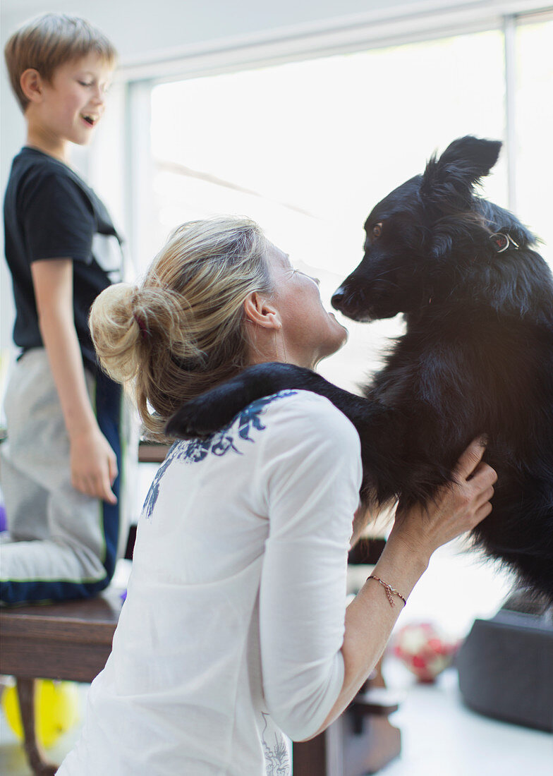 Affectionate woman with dog