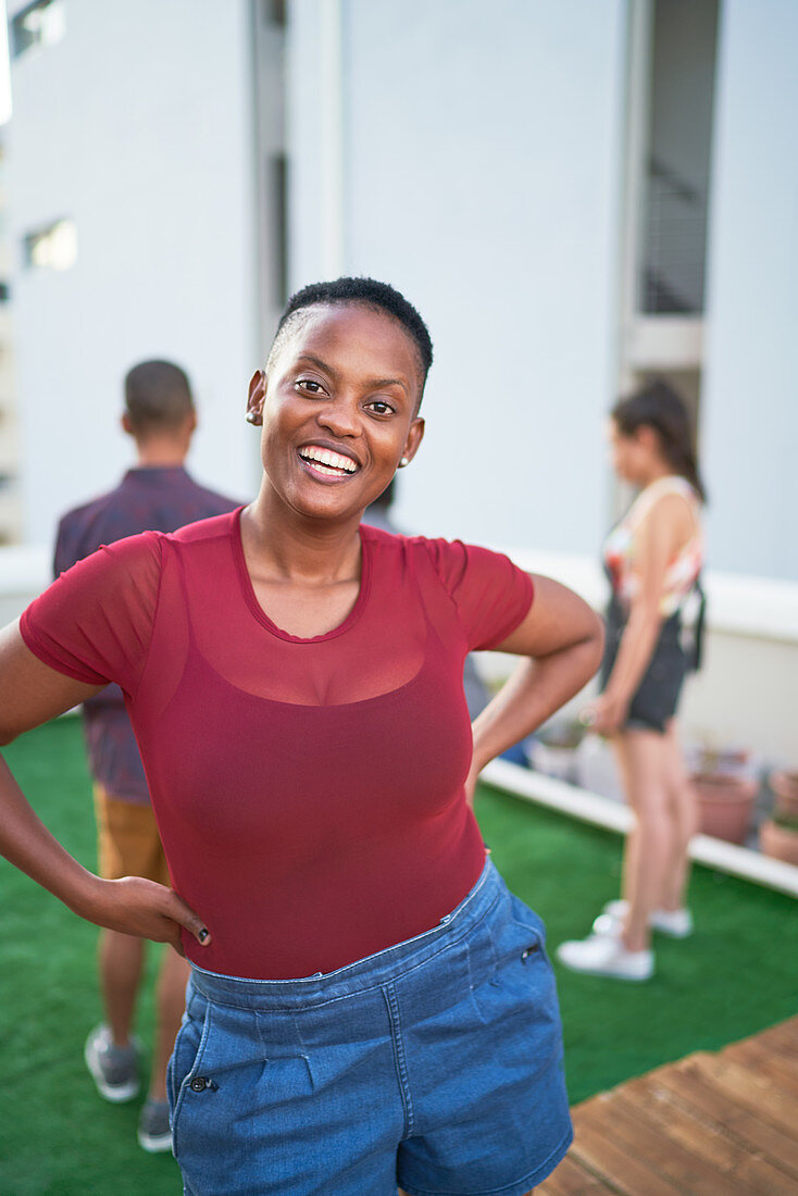 Portrait confident carefree young woman