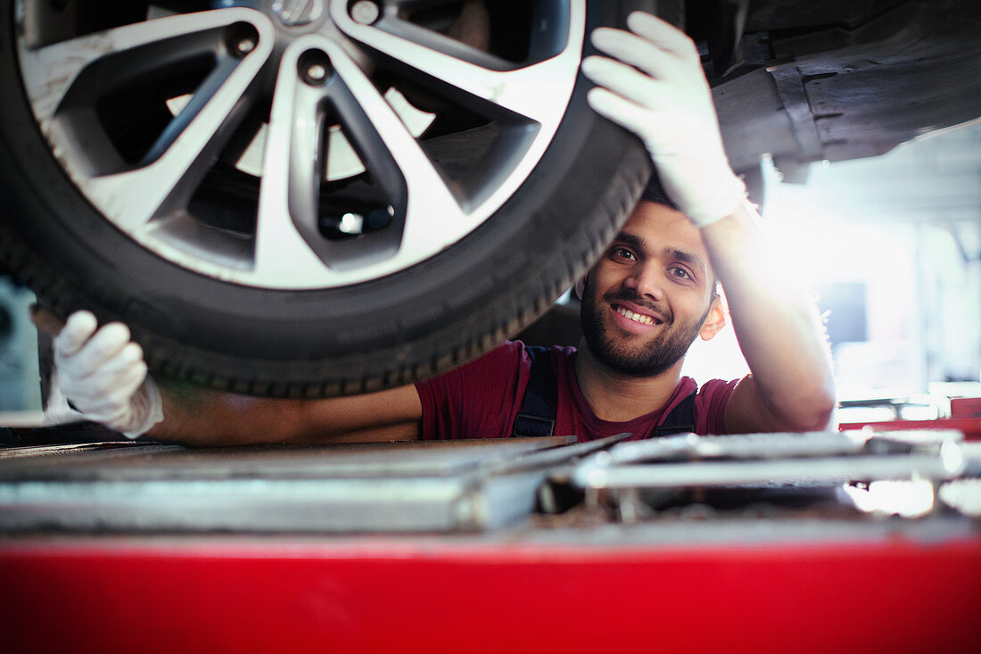 Portrait confident, smiling male mechanic
