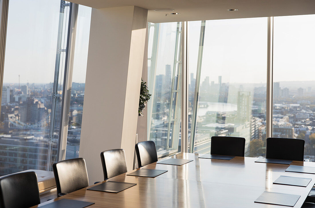 Modern conference room overlooking sunny city
