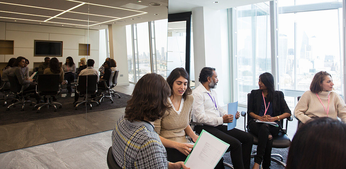 Business people talking in conference room meeting