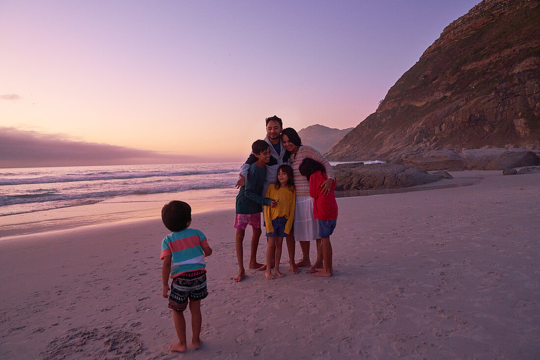 Happy family on ocean beach, South Africa