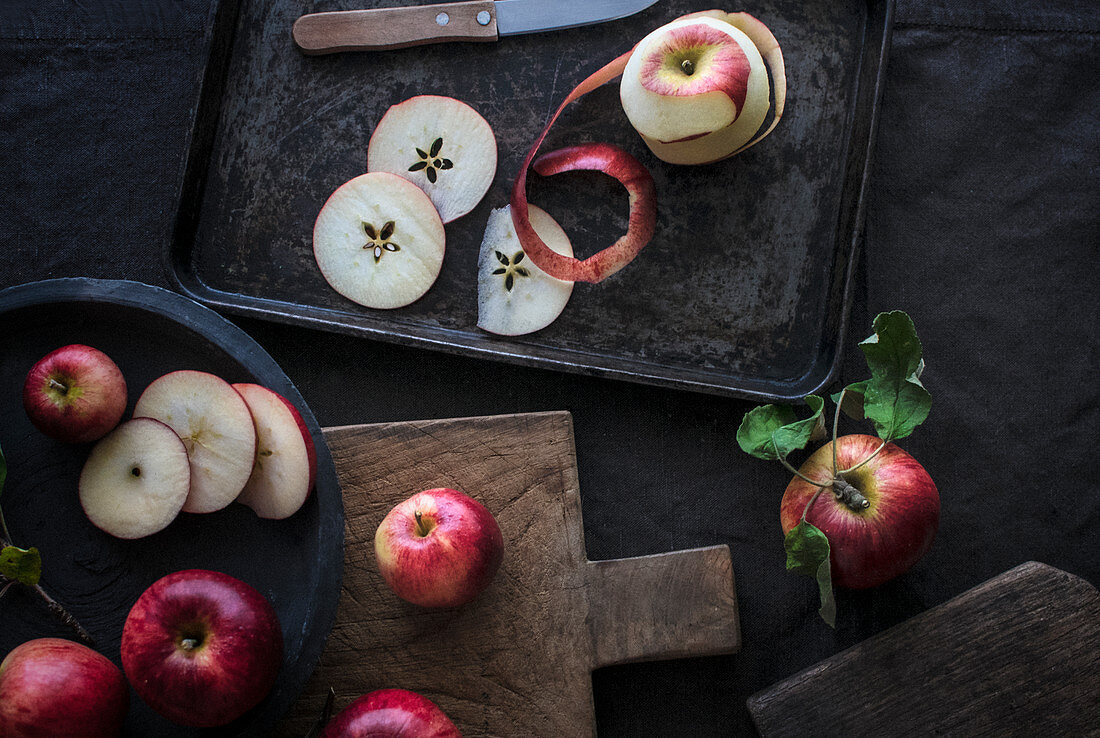 Fresh red apple slices on cutting board