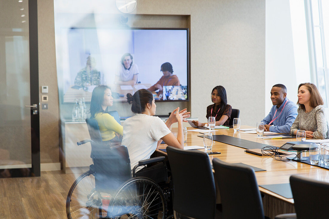 Business people talking and video conferencing