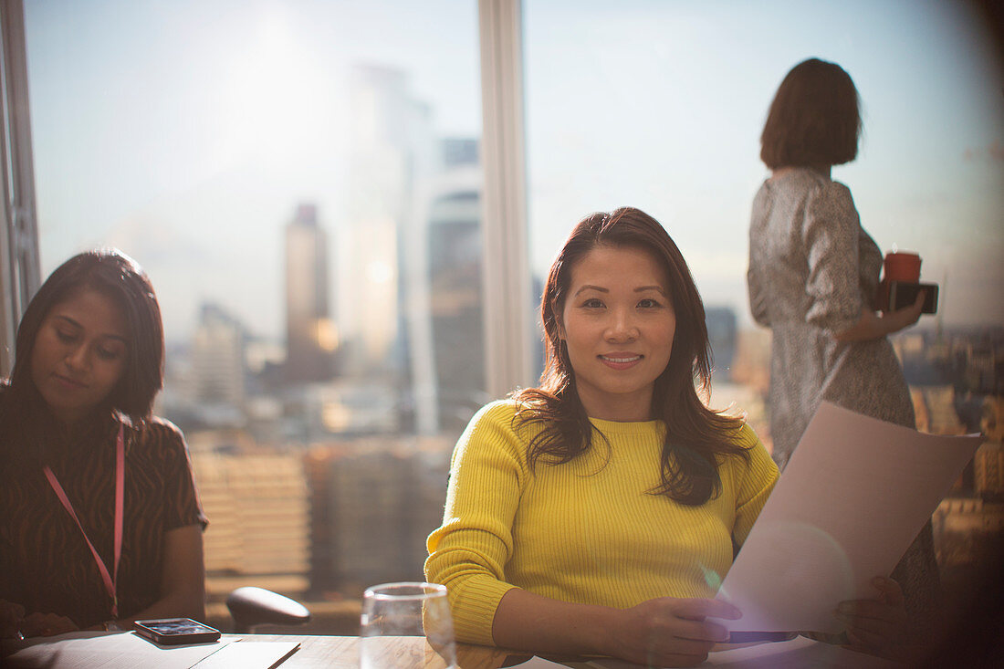 Businesswoman with paperwork meeting