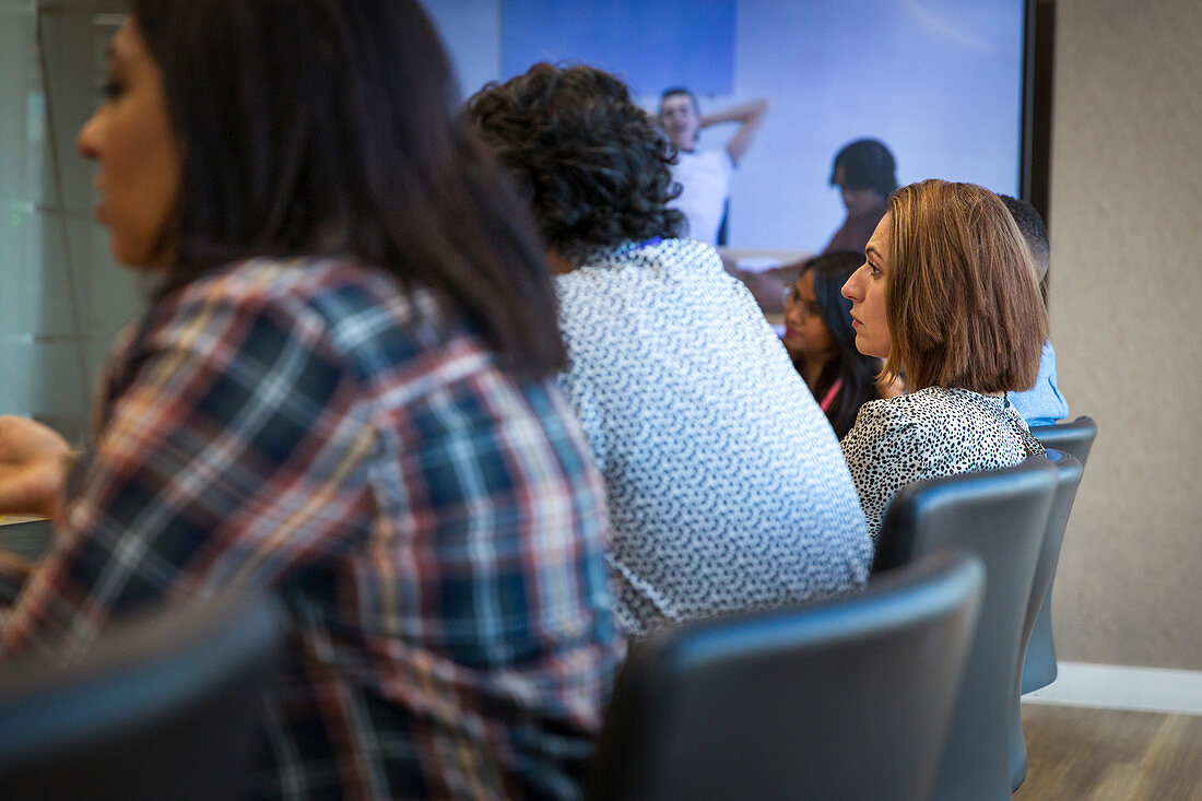 Businesswoman listening in video conference