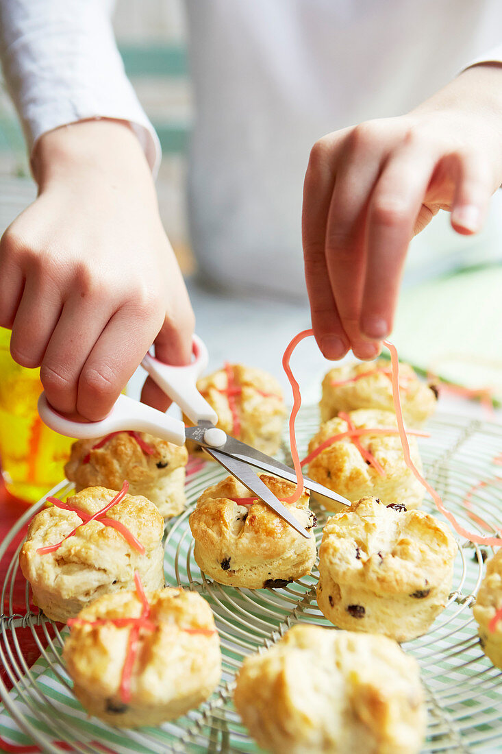 Decorating hot cross scones