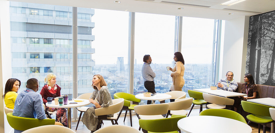 Business people talking and drinking coffee