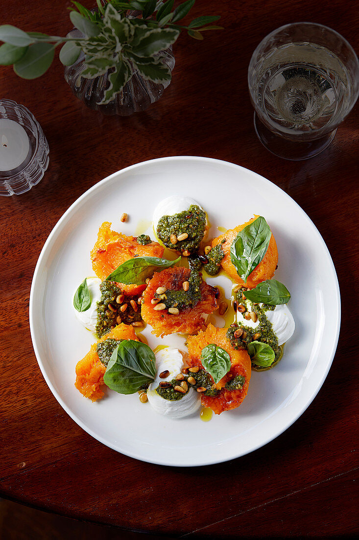 Roasted squash with goat's curd and lovage pesto