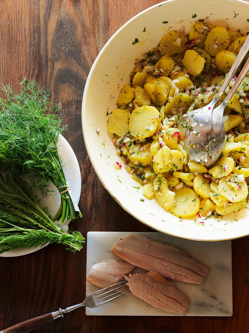 Potato salad with herring and dill