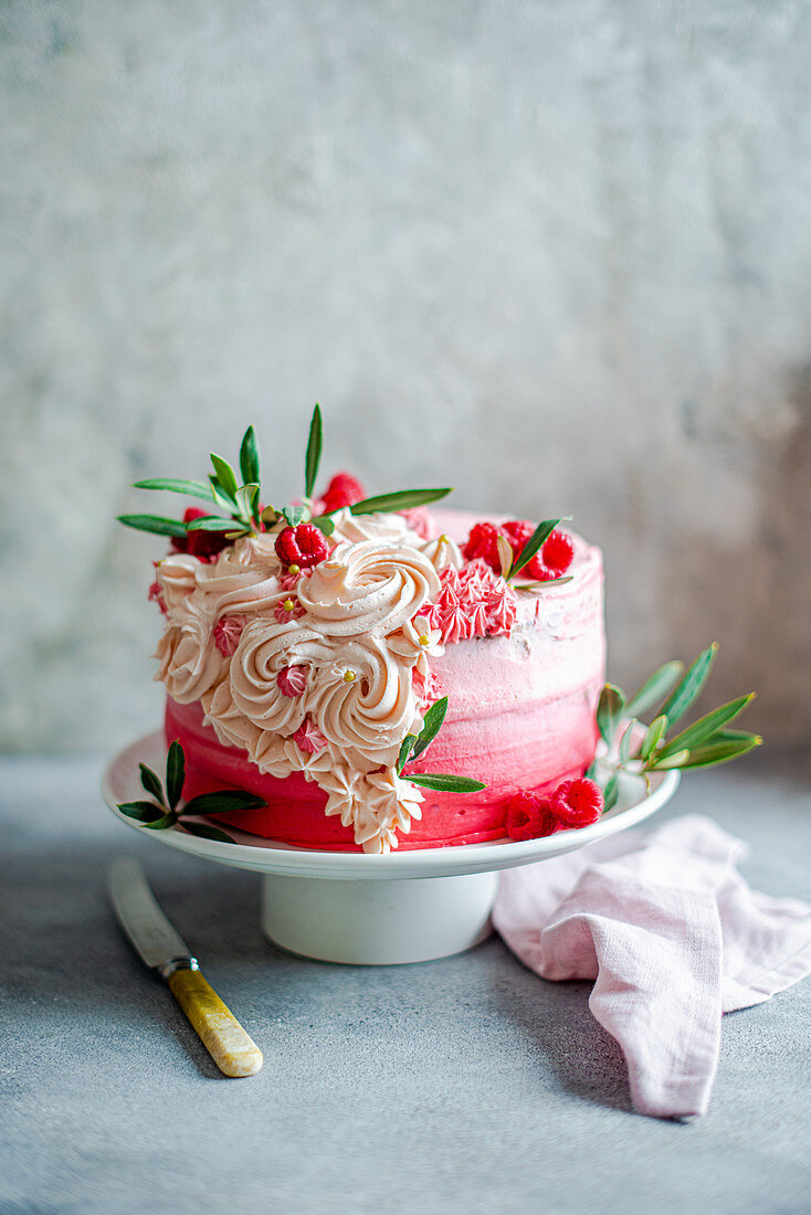 Sponge cake with pink buttercream icing