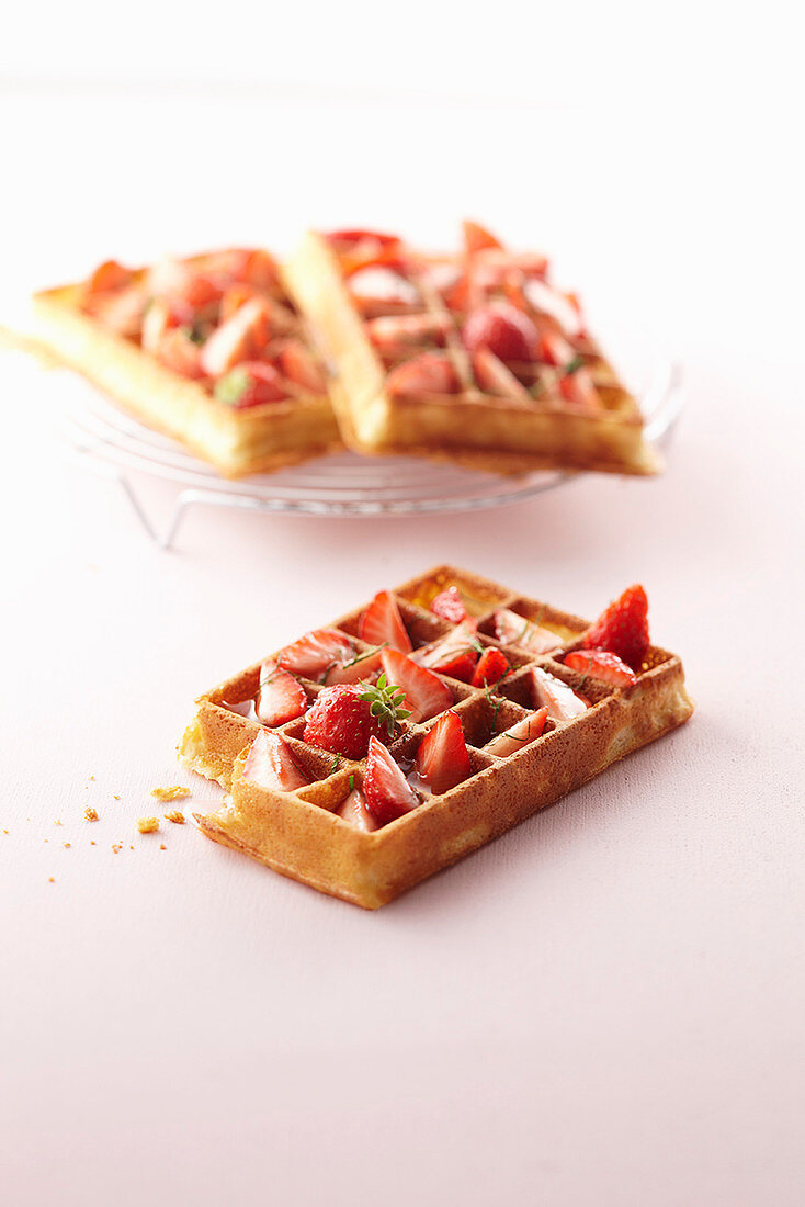 Waffles with strawberries and mint