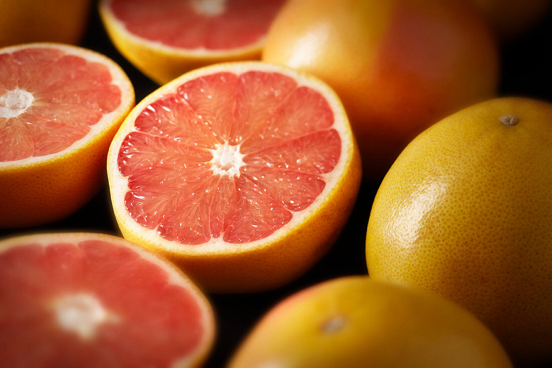 Grapefruit, whole and halved