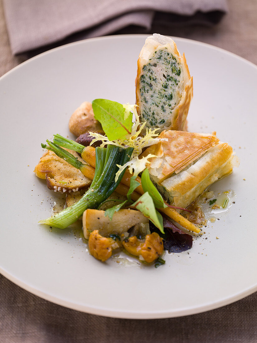 Herb strudel with sautéed chanterelle mushrooms