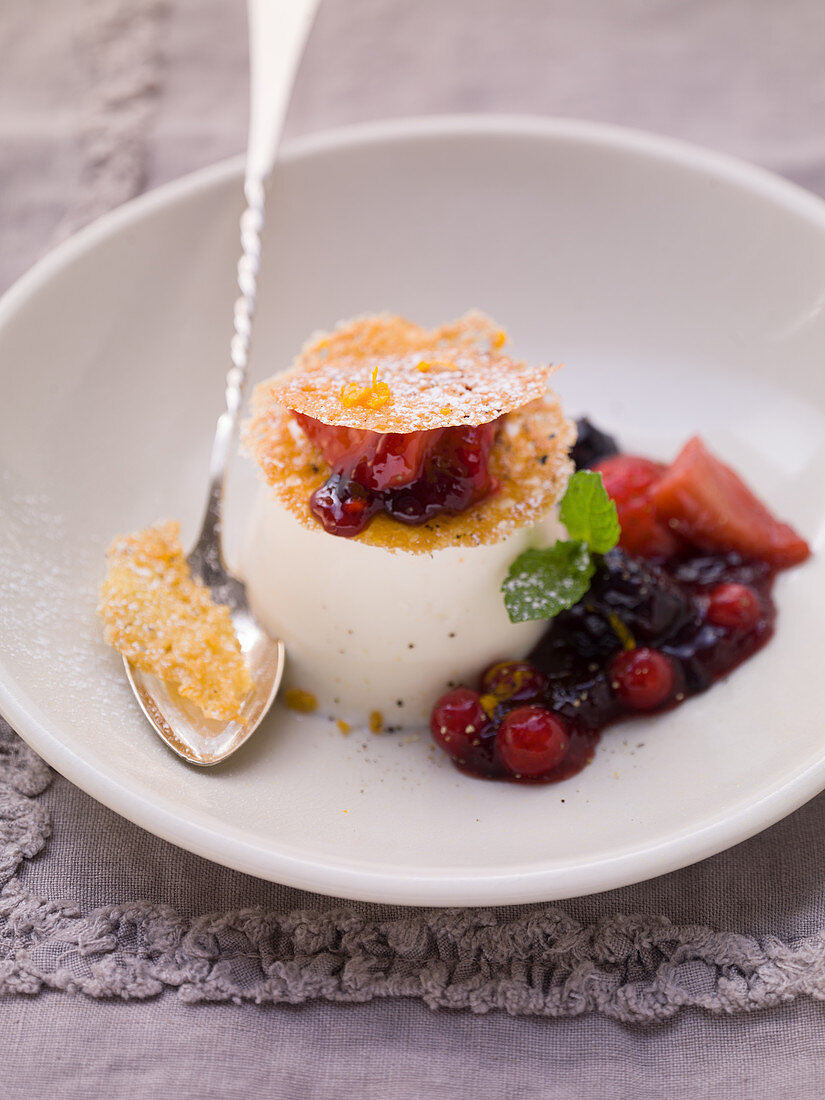 Milk pudding with berry compote