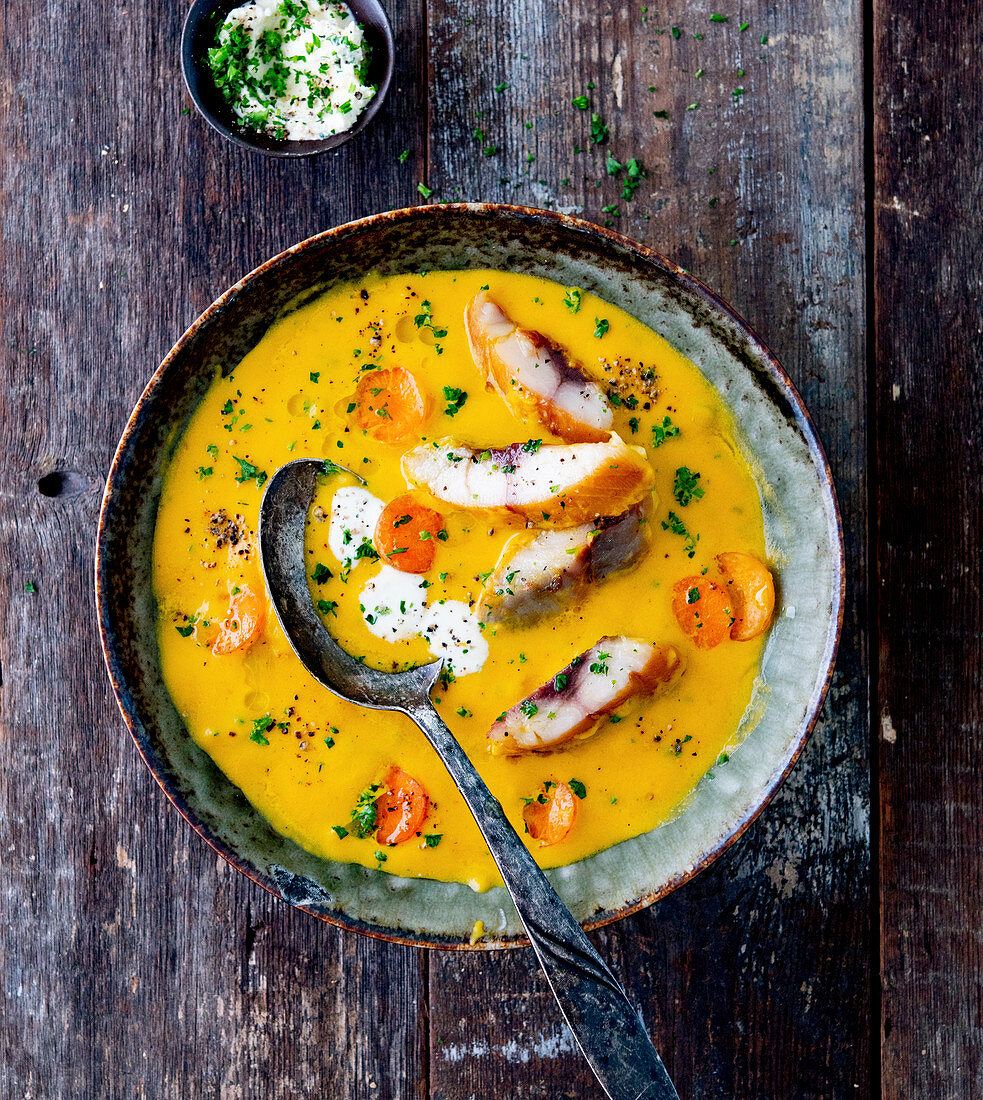 Carrot soup with mackerel fillets